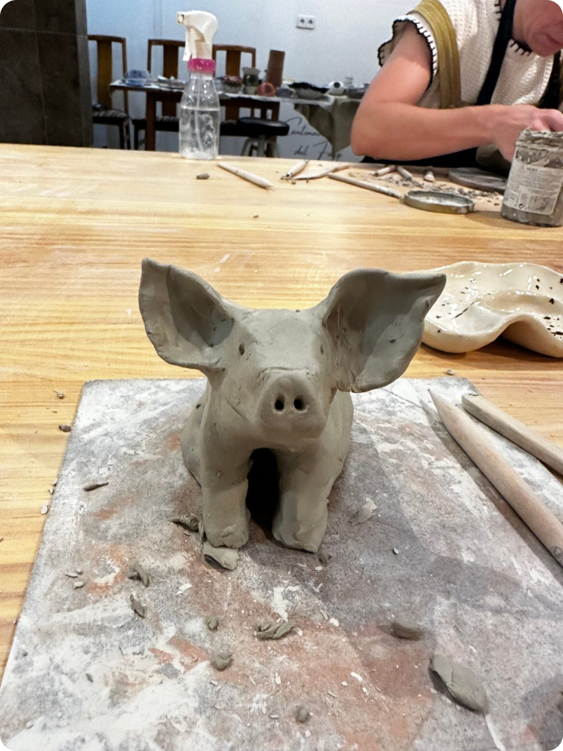 Clay pig sculpture